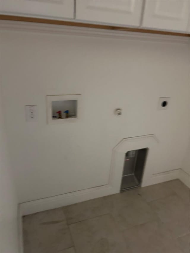 1308 Carlet Dr, Little Elm, TX 75068 - laundry room with tile patterned floors, hookup for a washing machine, electric dryer hookup, and baseboards