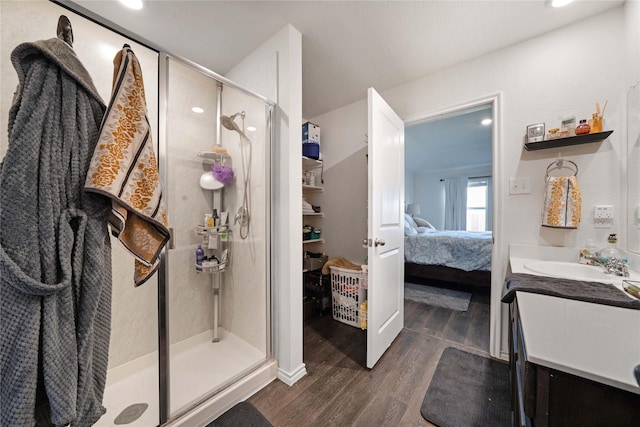 2212 Rosemary Way, Anna, TX 75409 - bathroom featuring ensuite bath, a stall shower, wood finished floors, and vanity