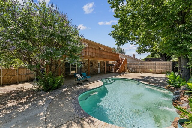 3233 Princess St, Bedford, TX 76021 - view of pool featuring a patio area, stairs, and a fenced backyard