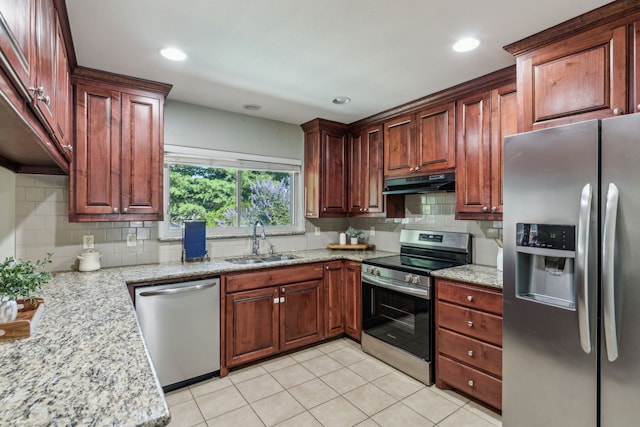 3233 Princess St, Bedford, TX 76021 - kitchen featuring appliances with stainless steel finishes, a sink, under cabinet range hood, backsplash, and recessed lighting