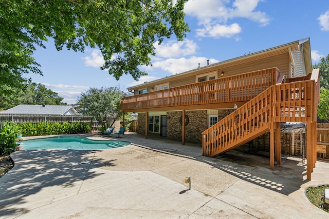 3233 Princess St, Bedford, TX 76021 - view of pool featuring a patio, a wooden deck, and stairs