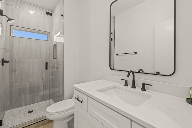 908 Muncie Ave, Dallas, TX 75212 - bathroom with vanity, a stall shower, and toilet