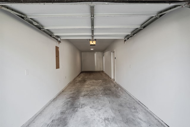 908 Muncie Ave, Dallas, TX 75212 - garage featuring a garage door opener and electric panel