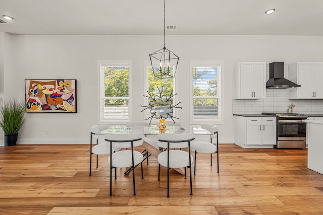 920 Muncie Ave, Dallas, TX 75212 - dining space with baseboards, recessed lighting, light wood-style flooring, a chandelier, and breakfast area