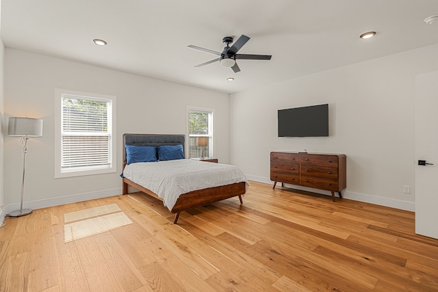 920 Muncie Ave, Dallas, TX 75212 - bedroom featuring multiple windows, light wood-style floors, baseboards, ceiling fan, and recessed lighting