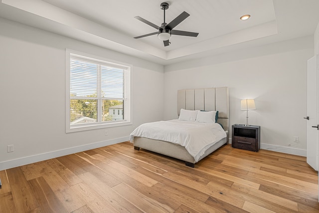 920 Muncie Ave, Dallas, TX 75212 - bedroom with a raised ceiling, light wood-type flooring, baseboards, recessed lighting, and ceiling fan