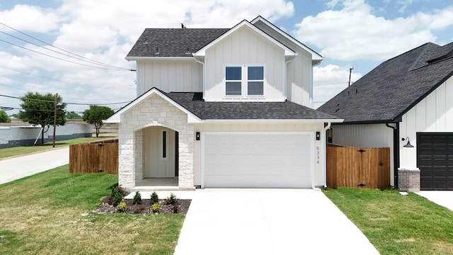 5336 Locke Ave, Fort Worth, TX 76107 - view of front of property with board and batten siding, a shingled roof, concrete driveway, and an attached garage