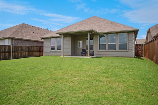 517 Big Horn Pass, Denton, TX 76210 - back of property with a patio area and roof with shingles