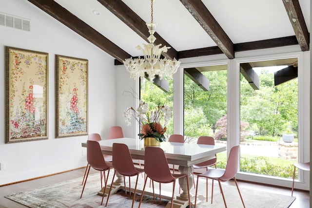 6210 Preston Creek Dr, Dallas, TX 75240 - dining area with a chandelier and wood finished floors