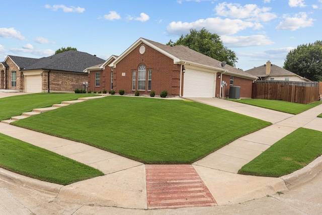 5749 Imes Ln, Fort Worth, TX 76179 - view of front of house with brick siding, central air condition unit, a garage, and concrete driveway
