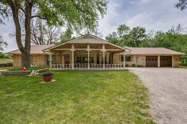 677 Fm 3356, Van Alstyne, TX 75495 - ranch-style house featuring covered porch, a front lawn, a garage, asphalt driveway, and roof with shingles