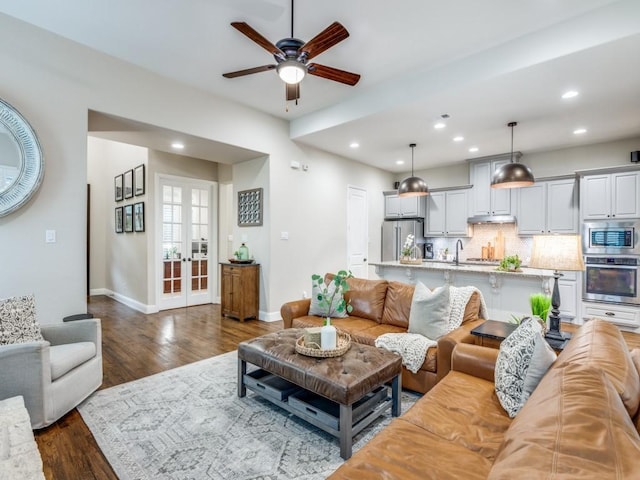 5717 Dr Kenneth Cooper Dr, Mckinney, TX 75070 - living area featuring baseboards, ceiling fan, dark wood finished floors, french doors, and recessed lighting