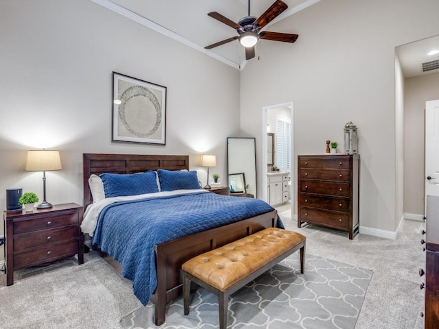 5717 Dr Kenneth Cooper Dr, Mckinney, TX 75070 - bedroom with crown molding, carpet floors, baseboards, ensuite bathroom, and a ceiling fan