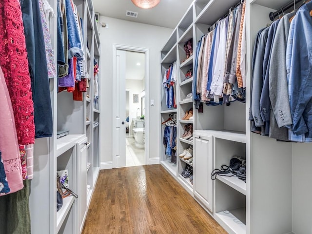 5717 Dr Kenneth Cooper Dr, Mckinney, TX 75070 - spacious closet with wood finished floors