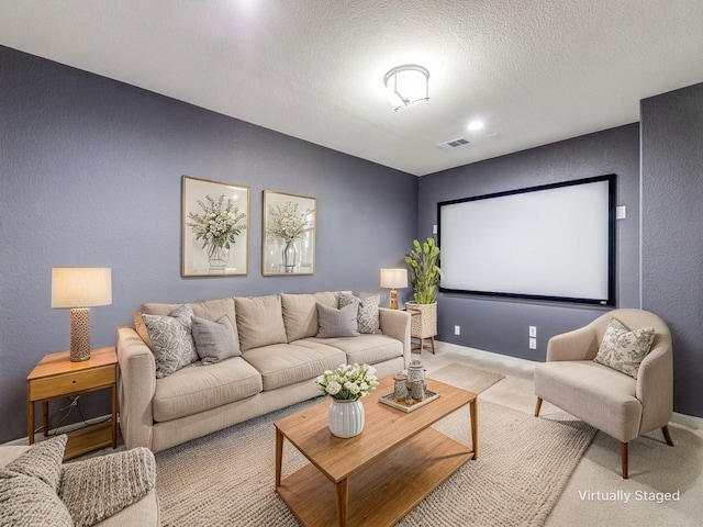 5717 Dr Kenneth Cooper Dr, Mckinney, TX 75070 - carpeted home theater with a textured ceiling and baseboards
