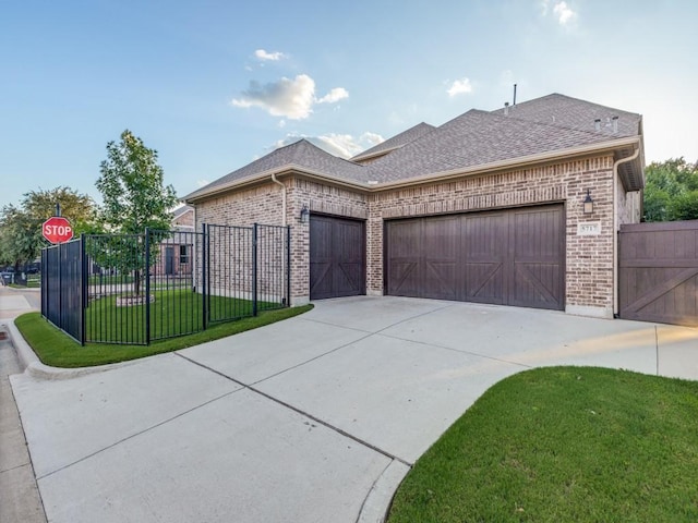5717 Dr Kenneth Cooper Dr, Mckinney, TX 75070 - view of front of home with brick siding, an attached garage, driveway, and a shingled roof
