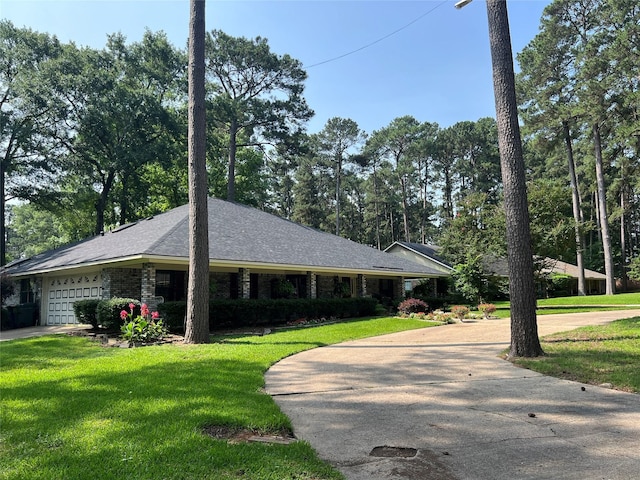 2101 Chase Bnd, Shreveport, LA 71118 - ranch-style home featuring a front lawn, an attached garage, and driveway