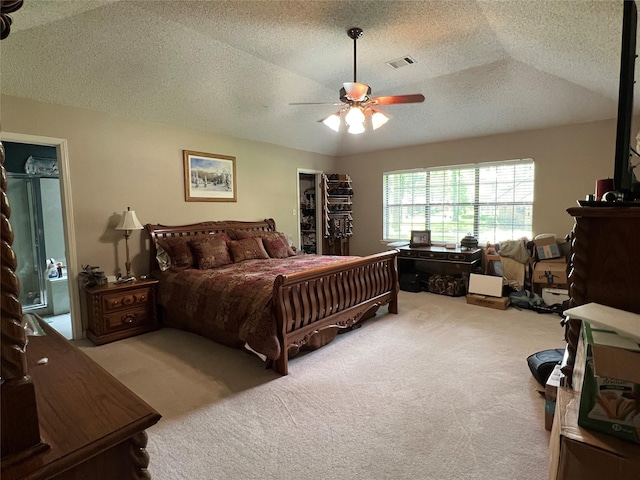 2101 Chase Bnd, Shreveport, LA 71118 - bedroom with carpet flooring, a textured ceiling, a ceiling fan, and a spacious closet