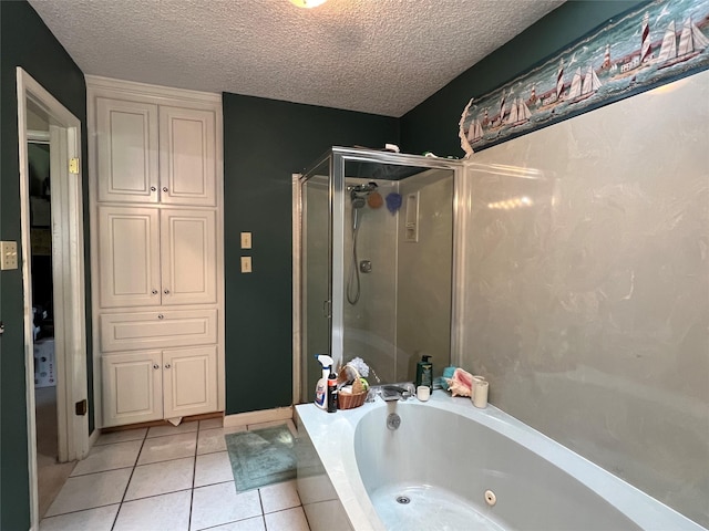 2101 Chase Bnd, Shreveport, LA 71118 - bathroom featuring a stall shower, a whirlpool tub, tile patterned flooring, and a textured ceiling