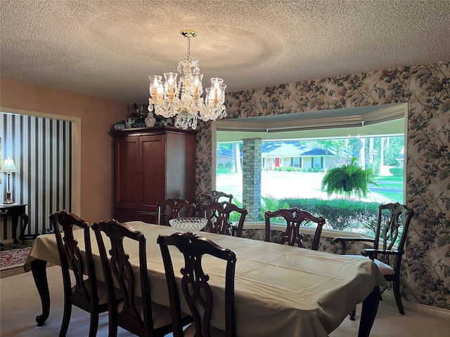 2101 Chase Bnd, Shreveport, LA 71118 - carpeted dining space featuring a chandelier and a textured ceiling