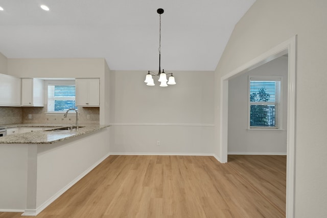 736 Lionel Way, Fort Worth, TX 76108 - unfurnished dining area with a sink, vaulted ceiling, light wood-style floors, a chandelier, and recessed lighting