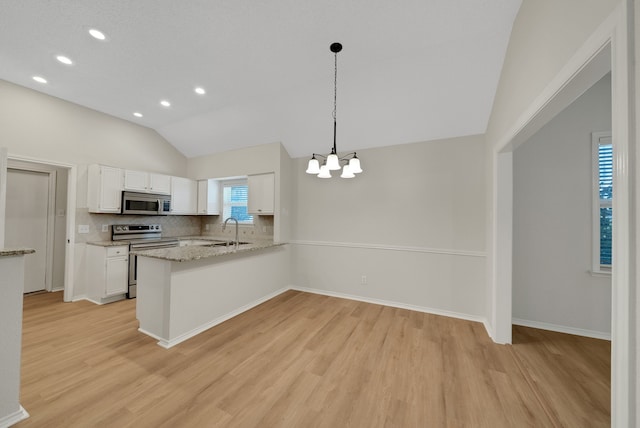 736 Lionel Way, Fort Worth, TX 76108 - kitchen with appliances with stainless steel finishes, a sink, lofted ceiling, white cabinets, and light wood-style floors