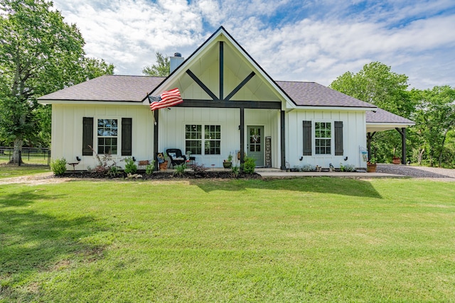 13530 Hiram Rd, Wills Point, TX 75169 - view of front of house featuring board and batten siding, a chimney, a shingled roof, and gravel driveway