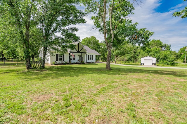 13530 Hiram Rd, Wills Point, TX 75169 - tudor-style house with a garage and an outbuilding