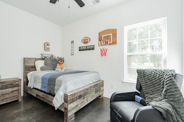 13530 Hiram Rd, Wills Point, TX 75169 - bedroom featuring finished concrete floors, a ceiling fan, and baseboards