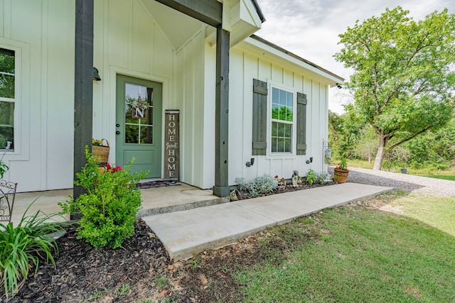 13530 Hiram Rd, Wills Point, TX 75169 - view of exterior entry featuring board and batten siding and covered porch