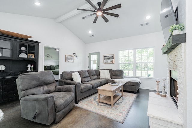 13530 Hiram Rd, Wills Point, TX 75169 - living area featuring beamed ceiling, ceiling fan, concrete floors, a stone fireplace, and recessed lighting