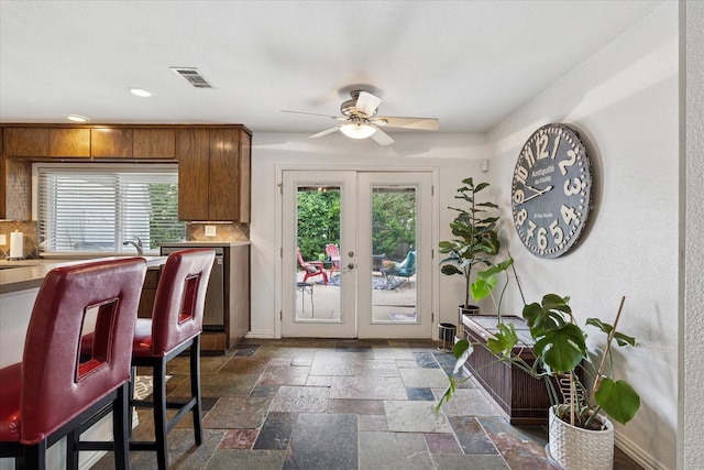 5020 Timber Creek Rd, Flower Mound, TX 75028 - kitchen featuring healthy amount of natural light, ceiling fan, french doors, recessed lighting, and stone tile flooring