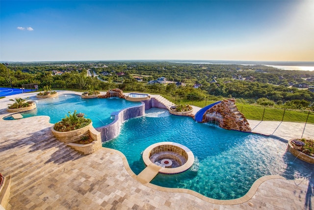 2449 Mountain View Ct, Cedar Hill, TX 75104 - view of swimming pool with a pool with connected hot tub and a patio area