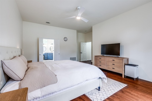 7905 Cherry Creek Dr, Plano, TX 75025 - bedroom with wood finished floors, ceiling fan, and ensuite bathroom