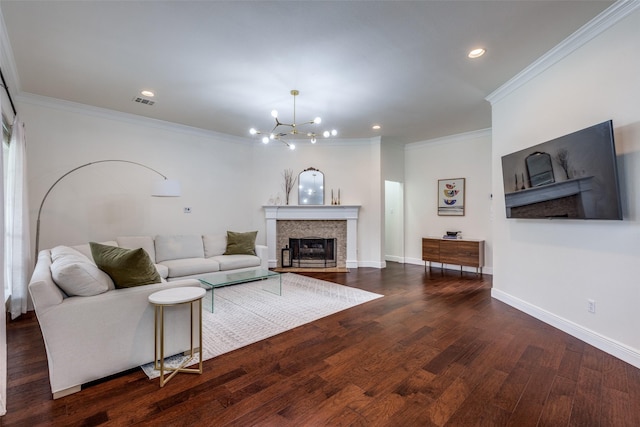 7905 Cherry Creek Dr, Plano, TX 75025 - living room with a fireplace with flush hearth, crown molding, a chandelier, wood finished floors, and recessed lighting