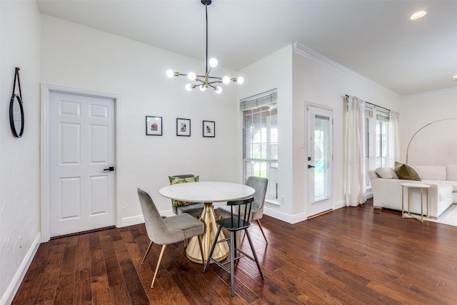 7905 Cherry Creek Dr, Plano, TX 75025 - dining space with plenty of natural light, a chandelier, wood finished floors, baseboards, and crown molding