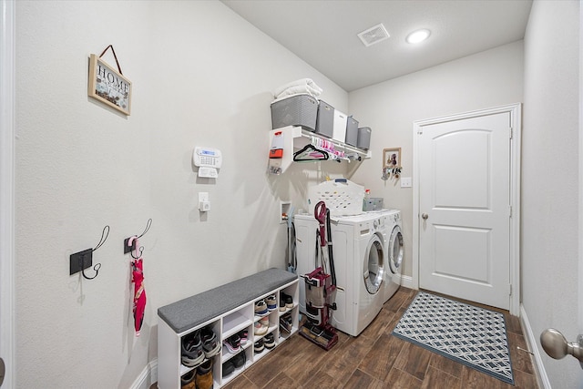 612 Redwood Dr, Greenville, TX 75402 - washroom with washer and clothes dryer, dark wood finished floors, and baseboards