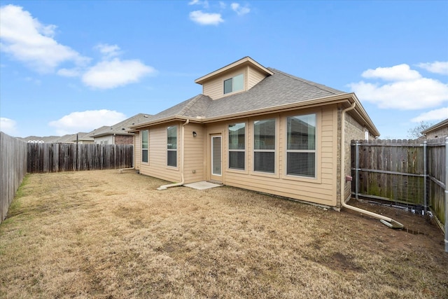 612 Redwood Dr, Greenville, TX 75402 - back of house with roof with shingles