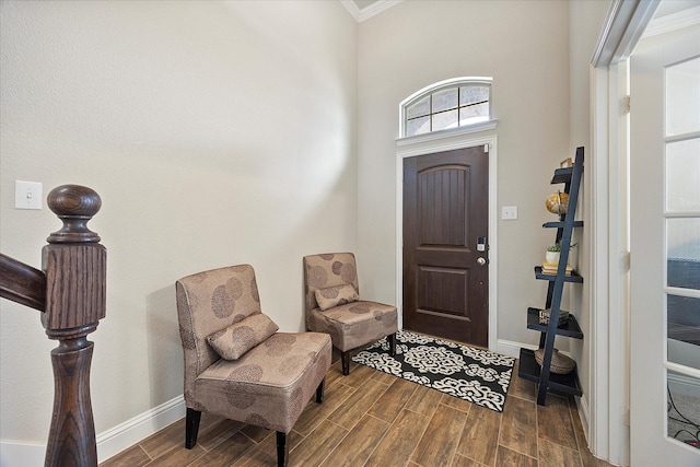 612 Redwood Dr, Greenville, TX 75402 - entryway featuring crown molding, dark wood-type flooring, and baseboards
