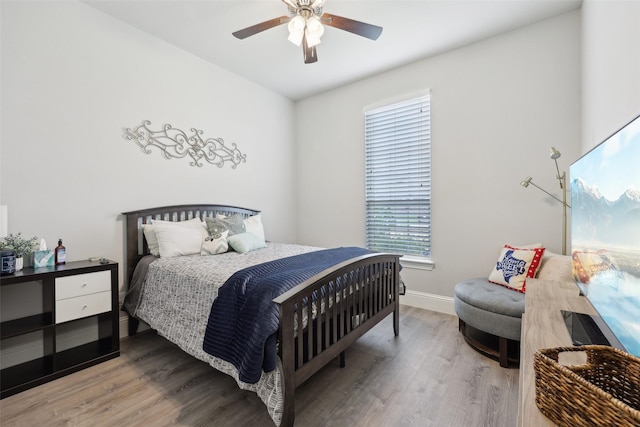 1305 Xeraco Dr, Little Elm, TX 75068 - bedroom featuring wood finished floors, baseboards, and a ceiling fan