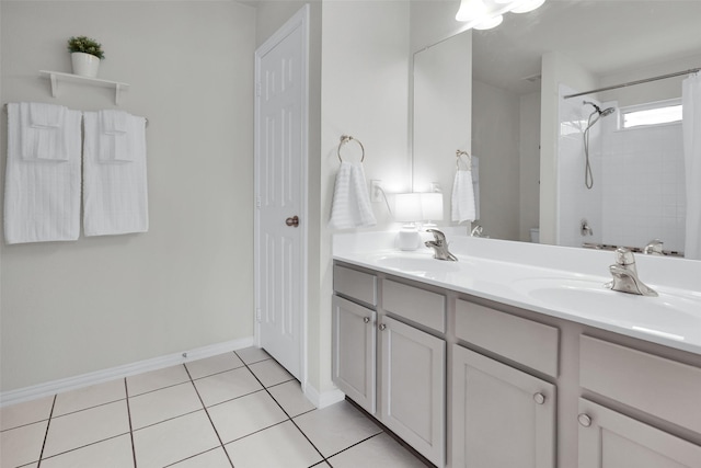 1356 Portsmouth Dr, Providence Village, TX 76227 - bathroom featuring double vanity, a shower, tile patterned floors, toilet, and baseboards