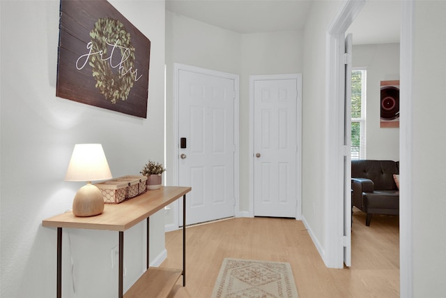 1356 Portsmouth Dr, Providence Village, TX 76227 - foyer with light wood-type flooring and baseboards