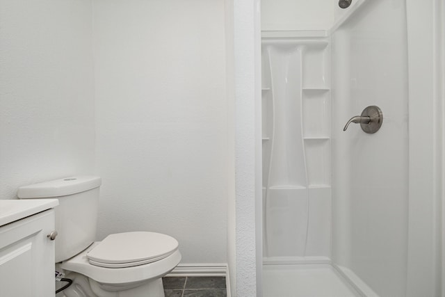 111 Leighton Dr, Terrell, TX 75160 - full bathroom featuring a shower stall, vanity, toilet, and tile patterned floors
