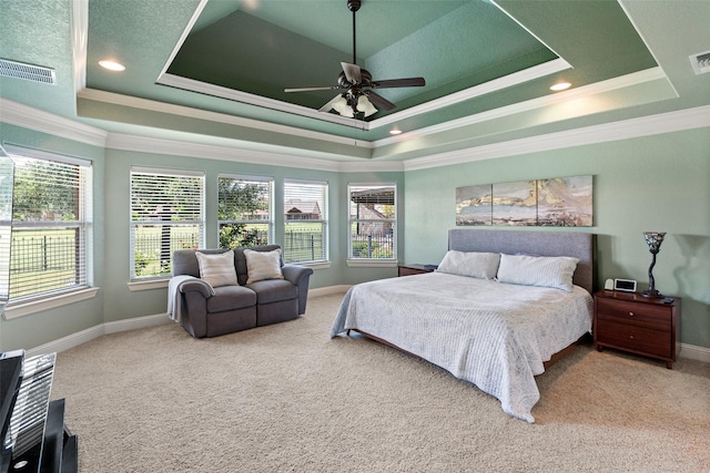 3303 Ferry Boat Ln, Granbury, TX 76049 - bedroom featuring a tray ceiling, carpet floors, multiple windows, and crown molding