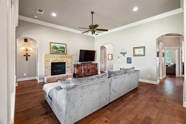 3303 Ferry Boat Ln, Granbury, TX 76049 - living area featuring ceiling fan, baseboards, ornamental molding, dark wood-type flooring, and arched walkways