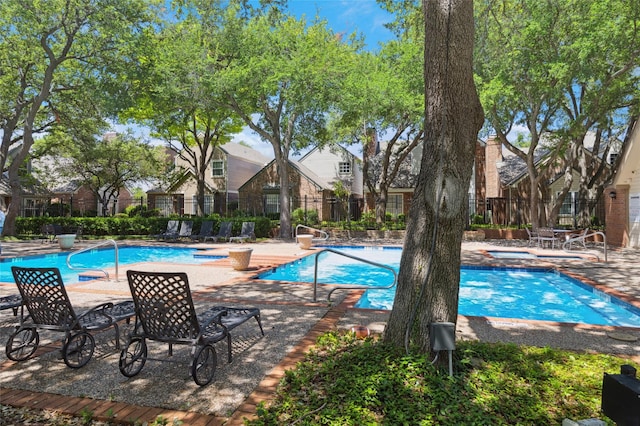 17820 Windflower Way Unit 503, Dallas, TX 75252 - community pool with a patio and a residential view