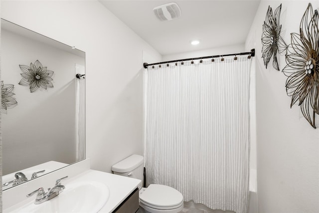 100 Samuel St, Denton, TX 76207 - bathroom featuring vanity, toilet, and shower / bath combination with curtain