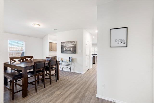 100 Samuel St, Denton, TX 76207 - dining area with light wood finished floors, baseboards, and recessed lighting