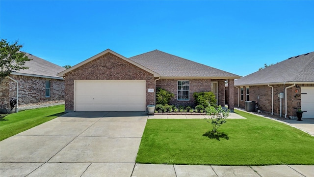 552 Lincoln Ave, Lavon, TX 75166 - view of front of house with an attached garage, central AC, a front yard, and brick siding