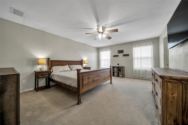 552 Lincoln Ave, Lavon, TX 75166 - bedroom featuring light carpet, baseboards, and ceiling fan